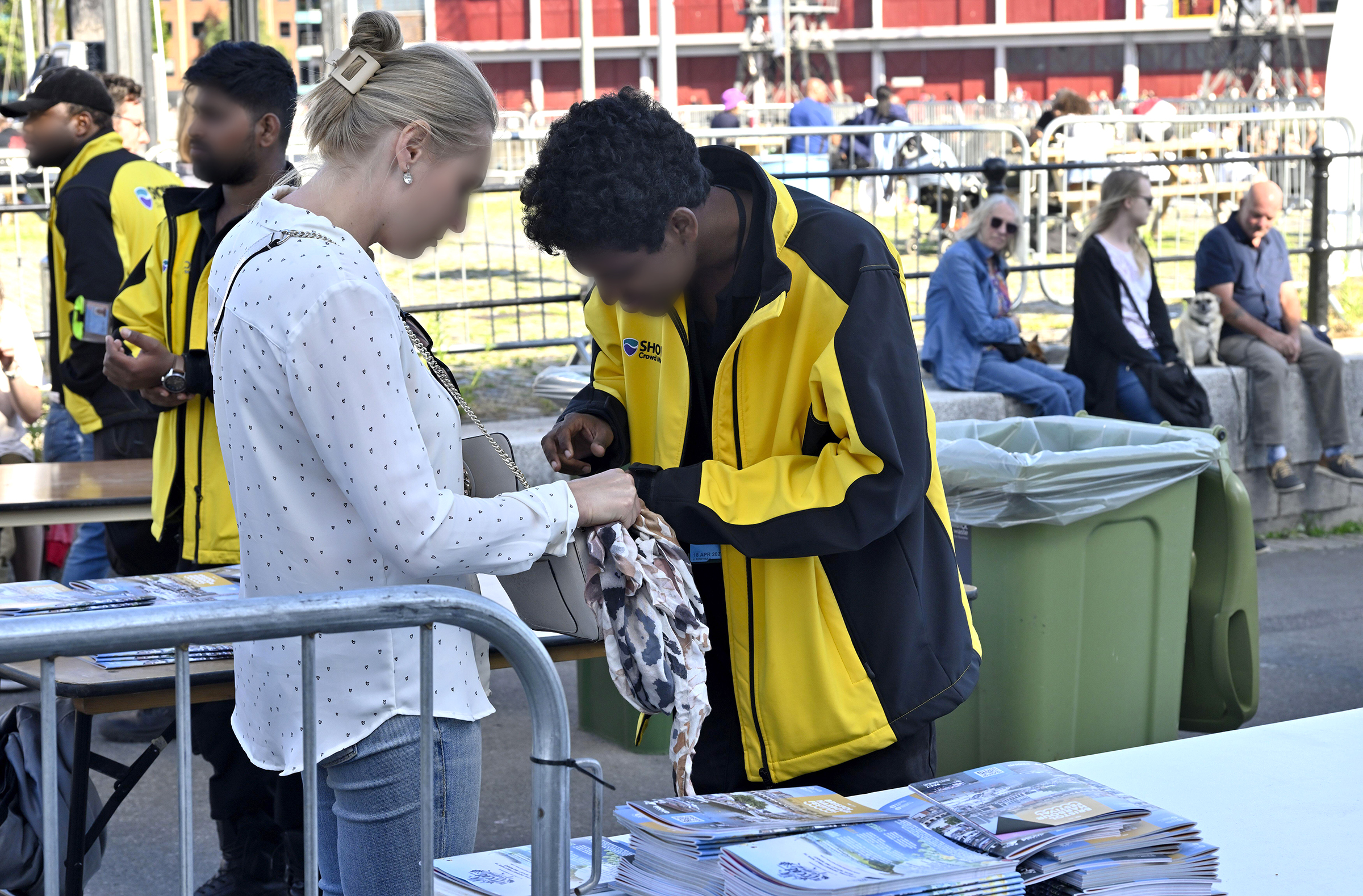 Security bag search at concert venue